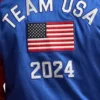 Jessica Chastain Paris 2024 Olympics Team USA Blue Satin Baseball Varsity Jacket Back Close UpJessica Chastain Paris 2024 Olympics Team USA Blue Satin Baseball Varsity Jacket Back Close Up