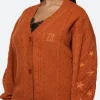 The Life Of A Showgirl Cardigan Cross Image